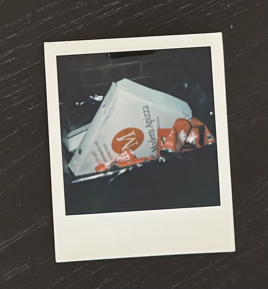 Polaroid of a Modern Apizza pizza box